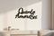 Modern living room with wooden wall decor saying 'Quanto Amore Sei' in black script