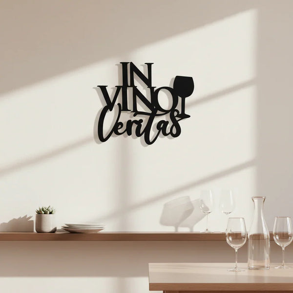 Black wooden wall decor reading 'In Vino Veritas' with wine glass silhouette, minimalist home setting