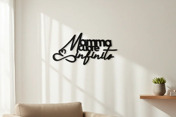 Black wooden wall decor with Italian phrase 'Mamma amore infinito' in modern living room with beige sofa and small plant