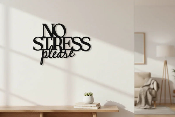 Black wooden wall decor with No Stress Please text in modern living room with sofa and lamp
