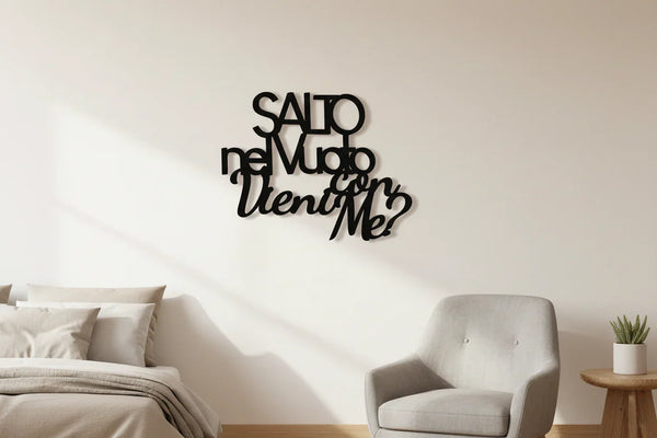 Modern living room with beige sofa, gray armchair, wooden side table with plant, and black Italian wooden wall decoration