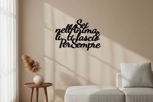 Cozy living room with beige wall, light sofa, wooden side table with vase and pampas grass, black Italian wall decor