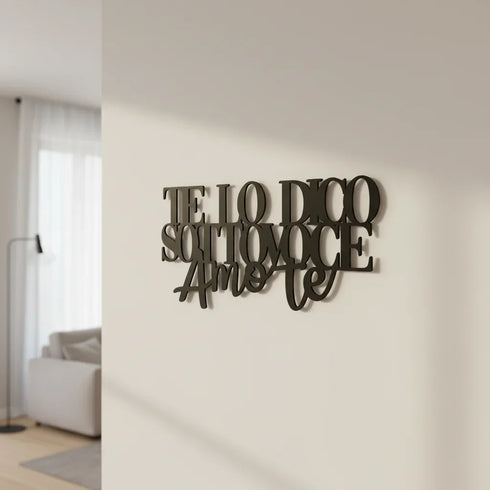 Black wooden wall decoration with Italian phrase 'TE LO DICO SOTTOVOCE Amo te' in modern living room