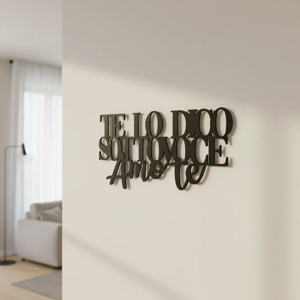 Black wooden wall decoration with Italian phrase 'TE LO DICO SOTTOVOCE Amo te' in modern living room